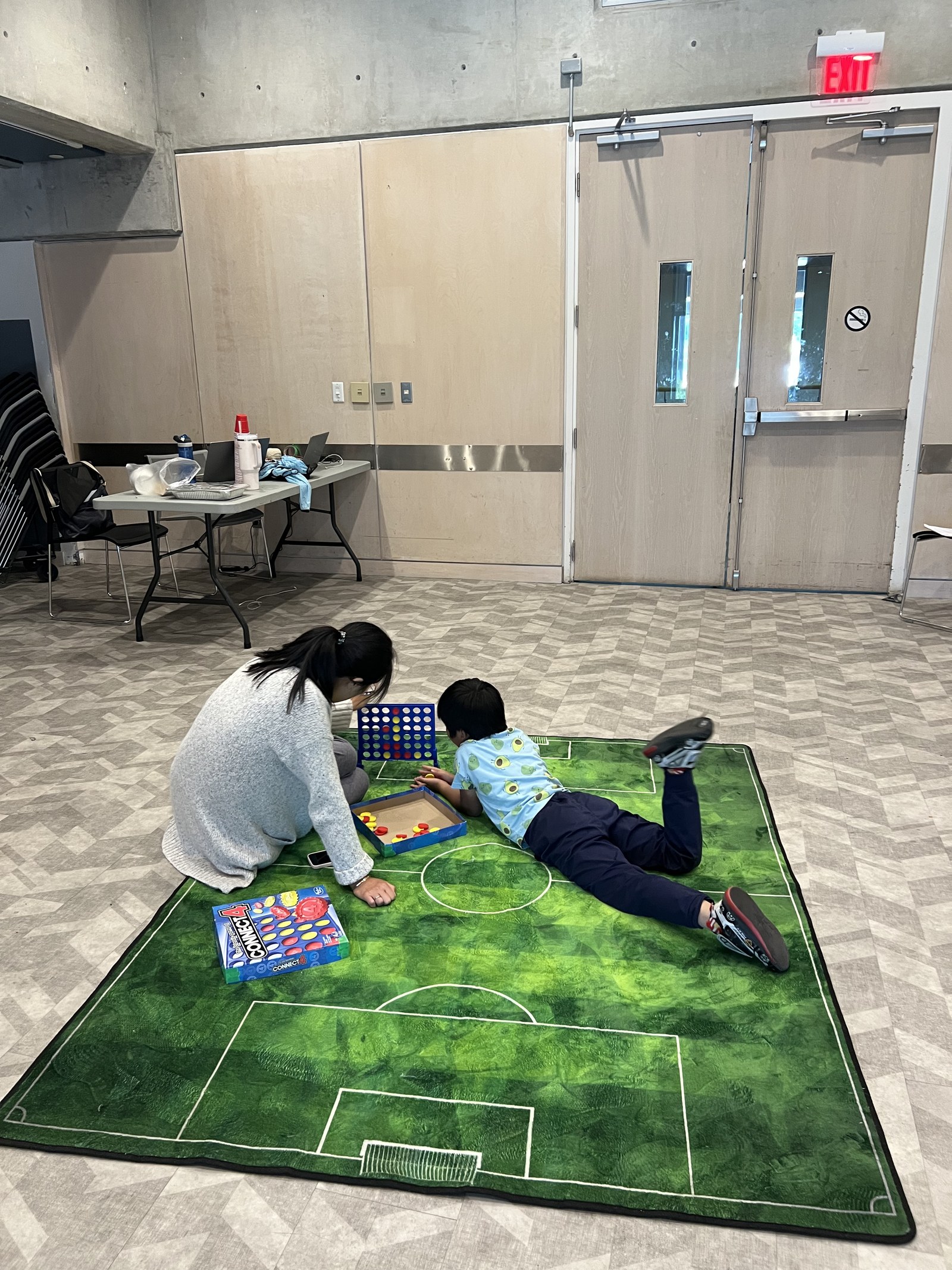 Instructor and student in a community learning space